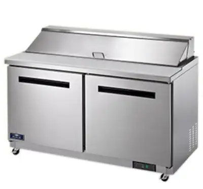 You are viewing a brand new Open Box 2 Door Solid SS Sandwich Salad Prep Table Cooler. This pricing...