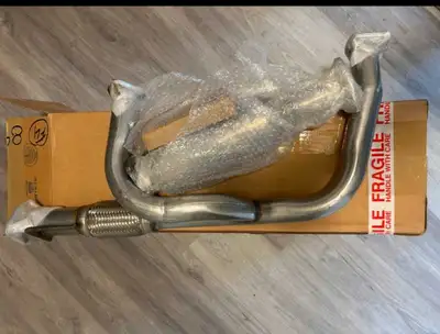 New, never installed front pipe and catalytic converter. Gaskets, nuts and bolts included in small b...