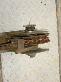 $100 · Two chain hoist pulleys with chains in good working order