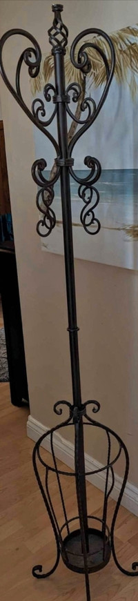 Beautiful Rod Iron Coat Rack in Excellent Condition.  Could use 