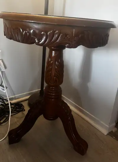Round side table with marble top and wooden frame, View more