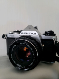 Pentax  ME 35mm SLR Film Camera W/ 50mm F/ 1. 7 Lens.