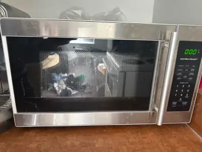 Selling a Hamilton Beach stainless steel countertop microwave in great working condition. Clean, rel...