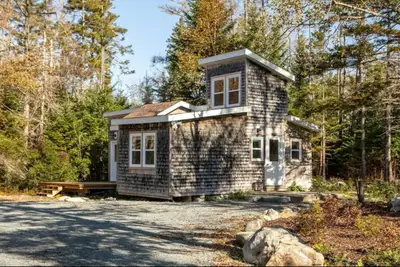 Cozy all season cabin in East Port Medway, located on Minister's Cove on 3 acres. This 900 sq/ft cot...