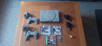 Original PlayStation 1. With games/controllers