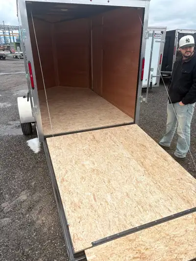 Used for 1 week to move my stuff across the country. It has: a spare tire, a 10 foot track installed...