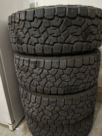 20” Armed Attack wheels with Toyo Open Country AT III tires
