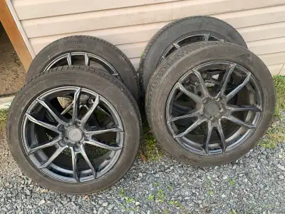 These wheels and tires are a sharp looking set the tires still have a lot of tread remaining Contine...
