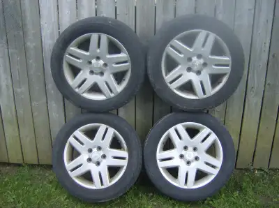 4 Good Impala Rims and Tires(used on a 2008): Still got lots of life on the tires. Asking 200.00. Ri...