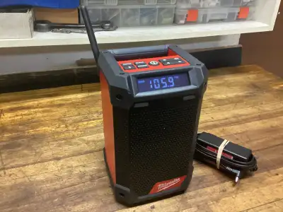 MILWAUKEE M12 BLUETOOTH AM/FM RADIO CHARGER and 3.0AH CP BATTERY, View more