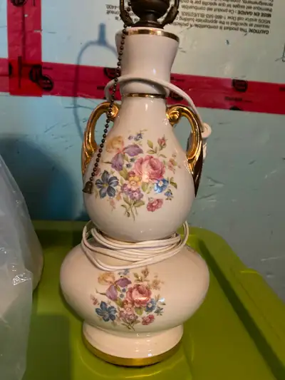 Ceramic table lamp with floral pattern. Shade included.