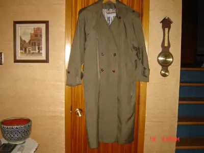 Trench Coat , light green, in very good condition. Saw similar one on Google for $298.00 . Asking $1...