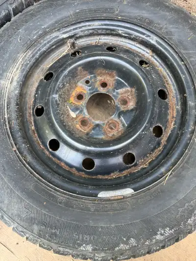 These 205/70R15 tires and wheels are being sold in a pre-owned condition, showing signs of visible w...