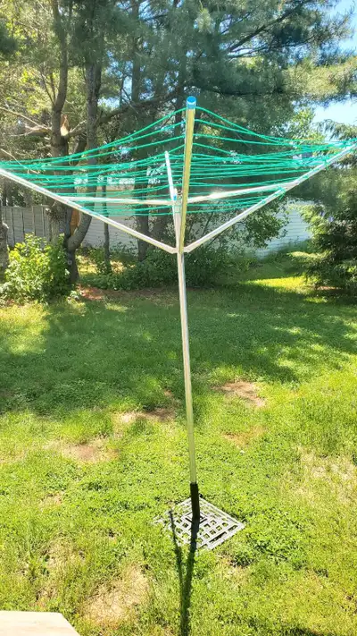 Fold up clothes line. $50 obo, stand not included.