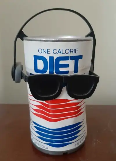 this is a 1990 sound activated dancing Diet Pepsi can. It works off of 2AA batteries and is fully fu...