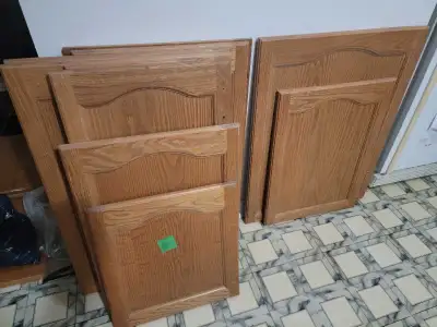 Oak kitchen cabinet doors $10 each Drawer faces $5 each Handles $2 Hinges $5 a pair. Door sizes: in...