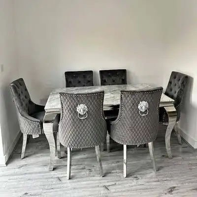 The Luxury Focus Upgrade your dining room with this stunning, high-end marble dining set featured in...