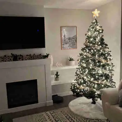 7 ft tree for sale Very bottom row of lights is out (picture was taken yesterday). Replacement light...