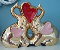 Gold elephant couple with trunks up and hearts vase figurine