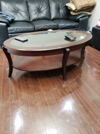 Solid wood table with glass on top