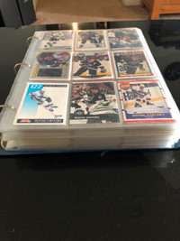 Vintage hockey and baseball card collection in binder 750 cards