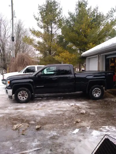 2014 GMC SERIA 1500 GOOD CONDITION. REBUILT TRANSMISSION. NEW USED FRONT DIFF. SOME MINOR DENTS AND...