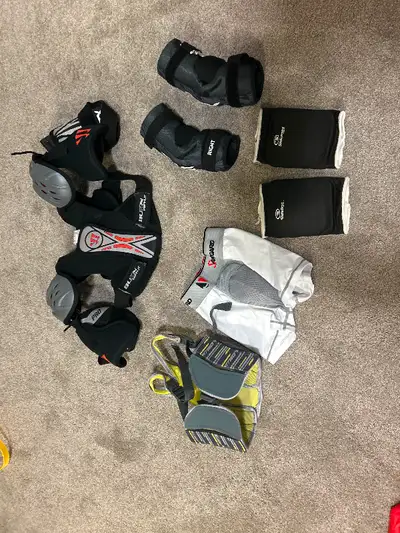 Small sized lacrosse gear. Fits about a 7 or 8 year old. Take it all for $30