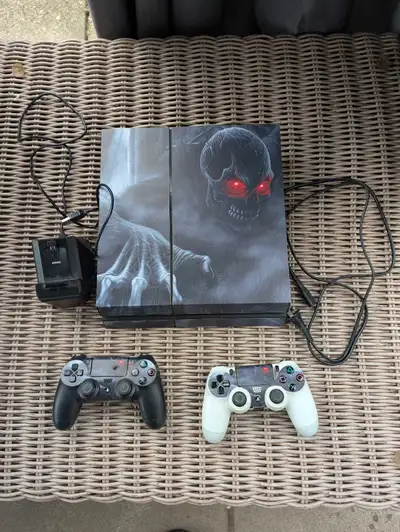 PS4 400 gigs + 2 Controllers and wireless charger, View more