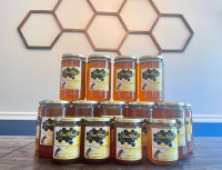 Honey! 100% pure, local, raw, unfiltered and unpasteurized. 