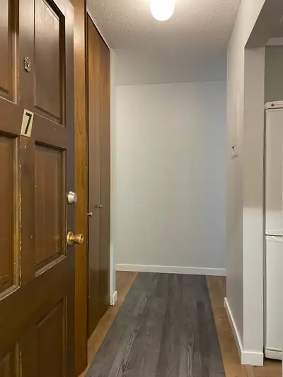 This is an older, larger and quite peaceful unit... RENOVATED -- newer paint and vinyl plank floorin...