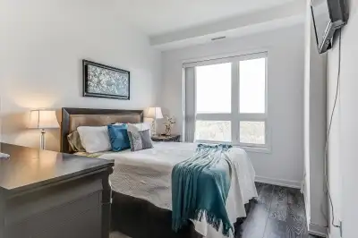 1 BED+DEN 1 BATH PENTHOUSE CONDO WITH LAKE VIEWS IN STONEY CREEK