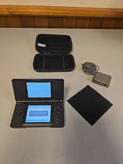 Nintendo Ds Lite With Carry Case Power Plug And Cleaner, View more