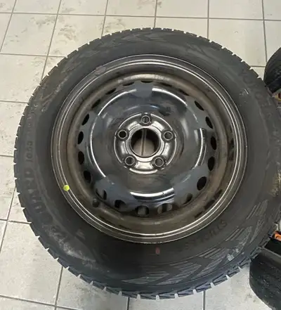 Yokohama ice guard winter tires 185/65/16 Only used one winter as sold car Bought and stored over su...