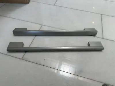Two different style Miele appliance handles, used on oven, microwave, steam / speed oven, dishwasher...