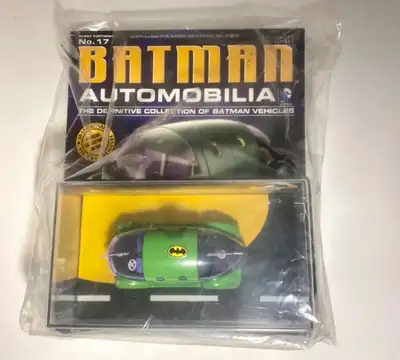 It is a die-cast vehicle that comes with a collector magazine. Each Batmobile comes with a unique 3-...