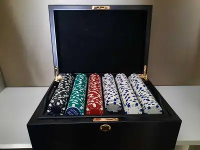 Elevate your poker nights with this sophisticated poker chip set, featuring a complete collection of...