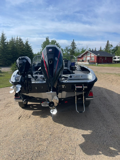 Lowrance electronics with Ghost bow mount and 15hp Pro Kicker. Showroom condition