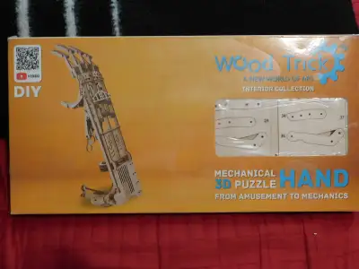 3-D WOOD PUZZLE MECHANICAL HAND $30 NEW, View more