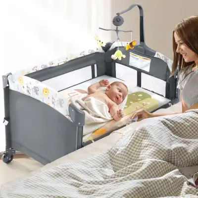 Brand new. Opened box. Colour Grey Bedside Cribs with Mattress,Portable Travel Crib Multifunctional...