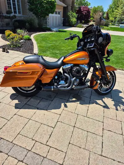 2014 Amber Whiskey Street Glide Special in excellent shape. 48,000km. Python Exhaust. 2 up seat with...