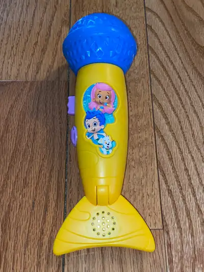 Very hard to find...Nick Jr BUBBLE GUPPIES Rocking MICRO FIN Yellow Talking Microphone Fisher Price....