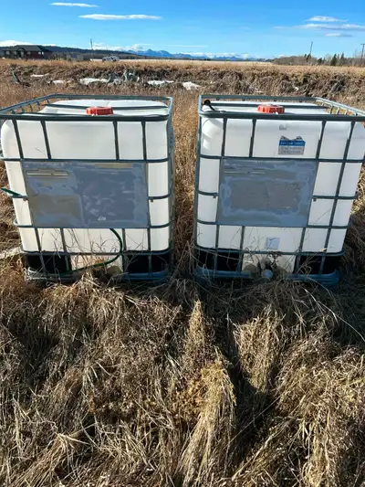 Diesel Slip tank with Trailer like to sell both together - 2,500$ Water Containers Both good conditi...