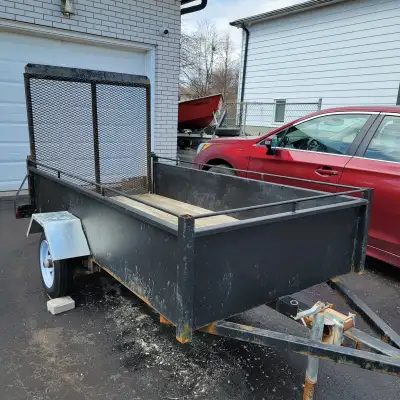 completely rebuilt trailer, new tires, new wheels, new bearings, new frame. 2 inch hitch. new 2 by 4...