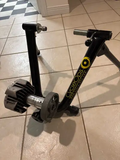 Please come get it. It’s yours. Works fine. Don’t need it. CycleOps bike trainer! This used trainer...