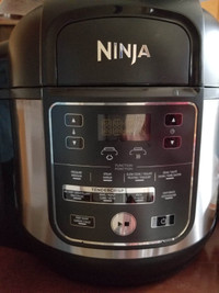 Ninja Foodi, like new. Includes pressure cooker top. Barely used