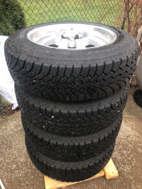  Four  Tires and Rims  215/65R17