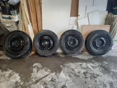 225/65/17 Road boss winter tires & rims. Used only 1 1/2 seasons, 90% tread left. Just came off a 20...