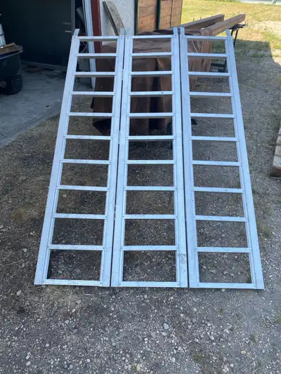 Aluminum loading ramp . Excellent condition only used a few times. Nothing bent or broken, folds eas...