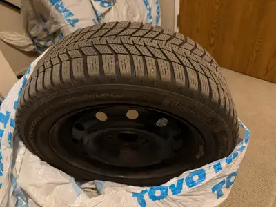 Full set of winter tires with steel rims for sale. Brand : Continental. Used for one and a half seas...