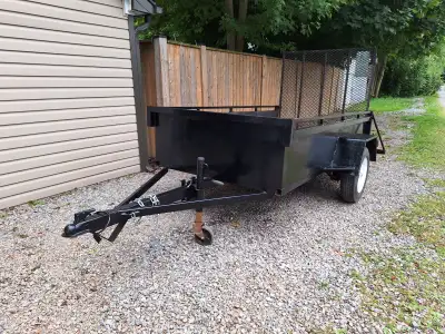 Utility trailer 4'2" wide x 8' long 4' fold down gate good tires wheel bearings serviced 2" ball has...